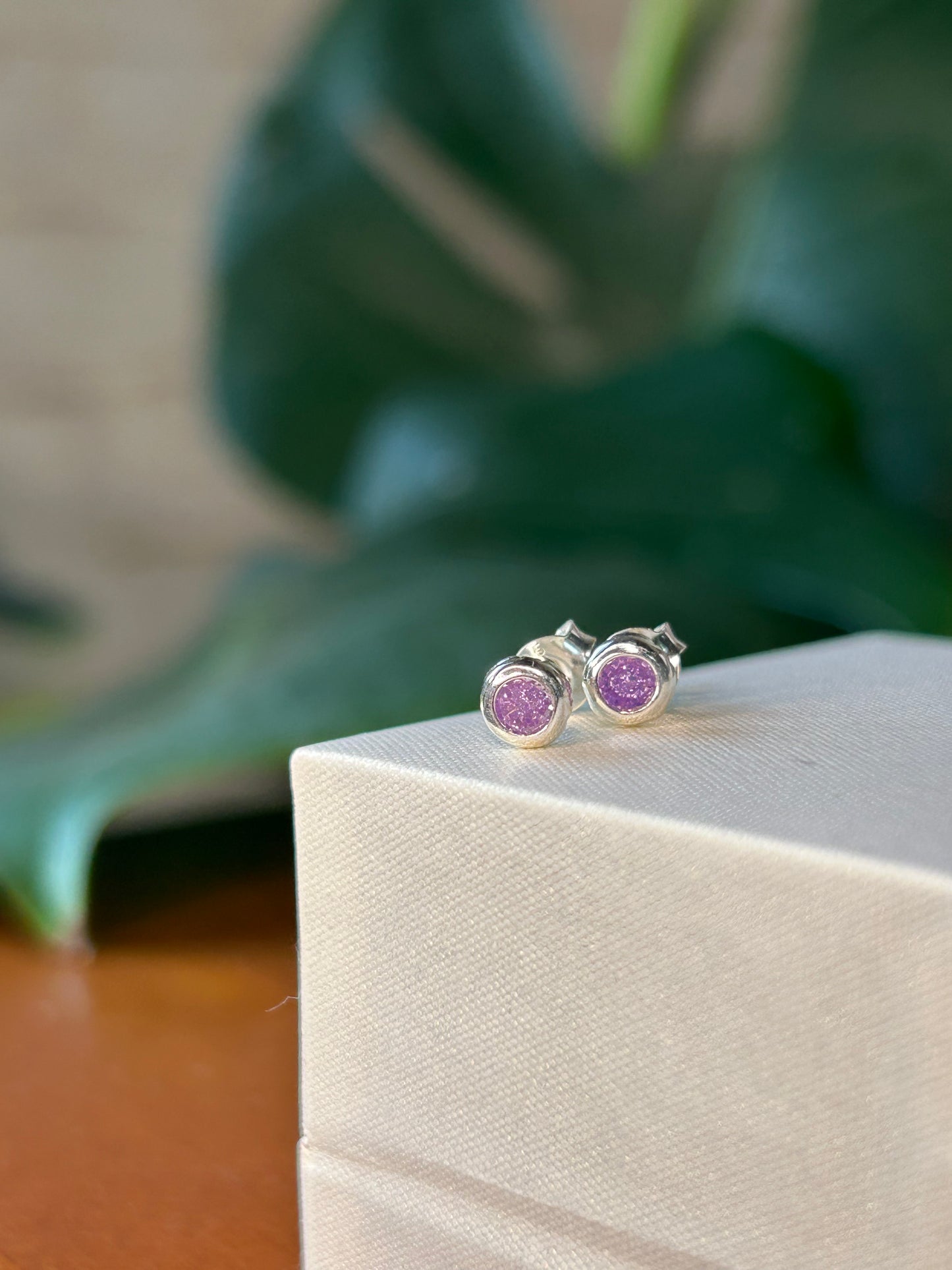 Caravanas punto de luz violeta