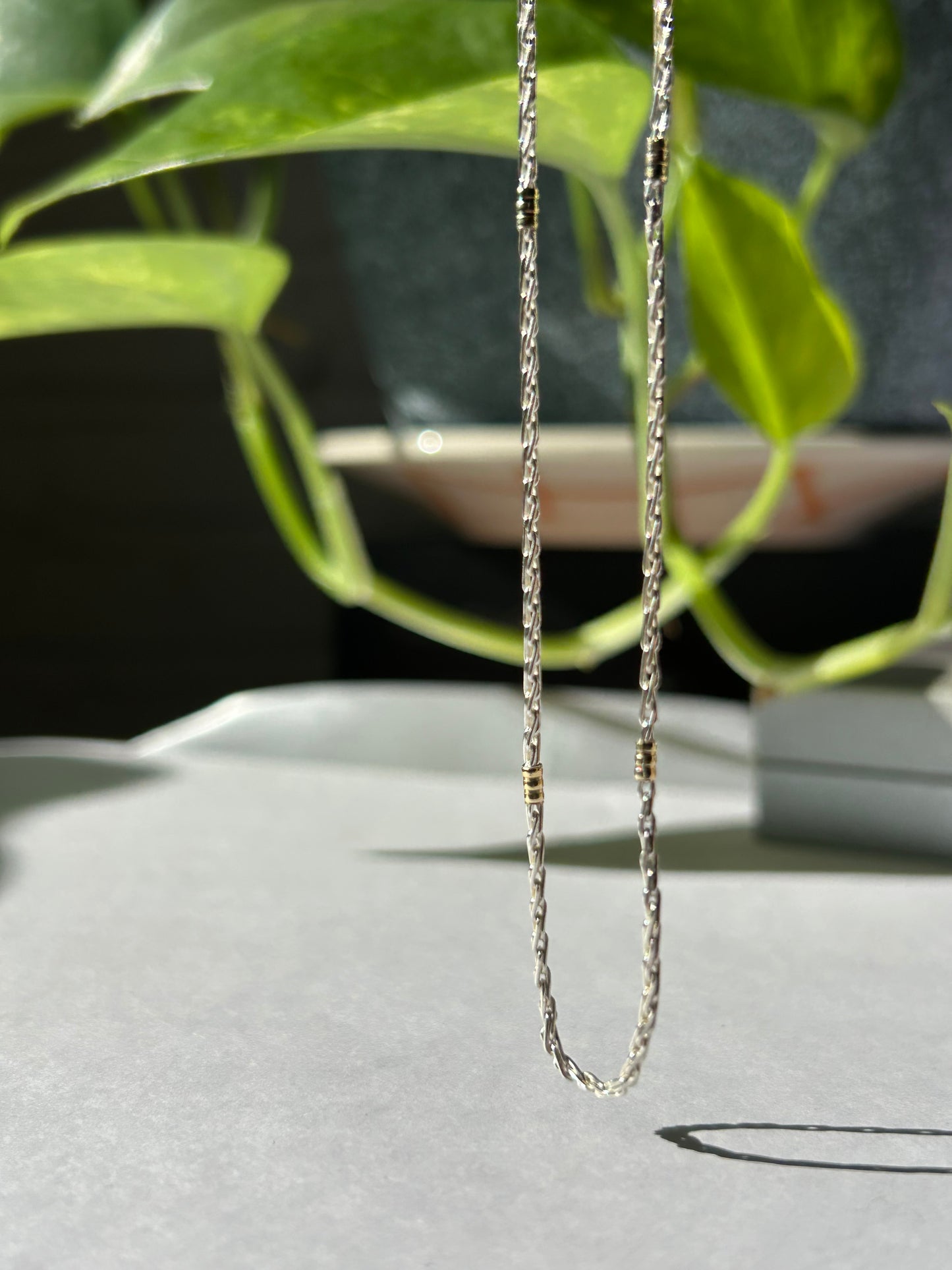 Cadena tourbillon plata y oro