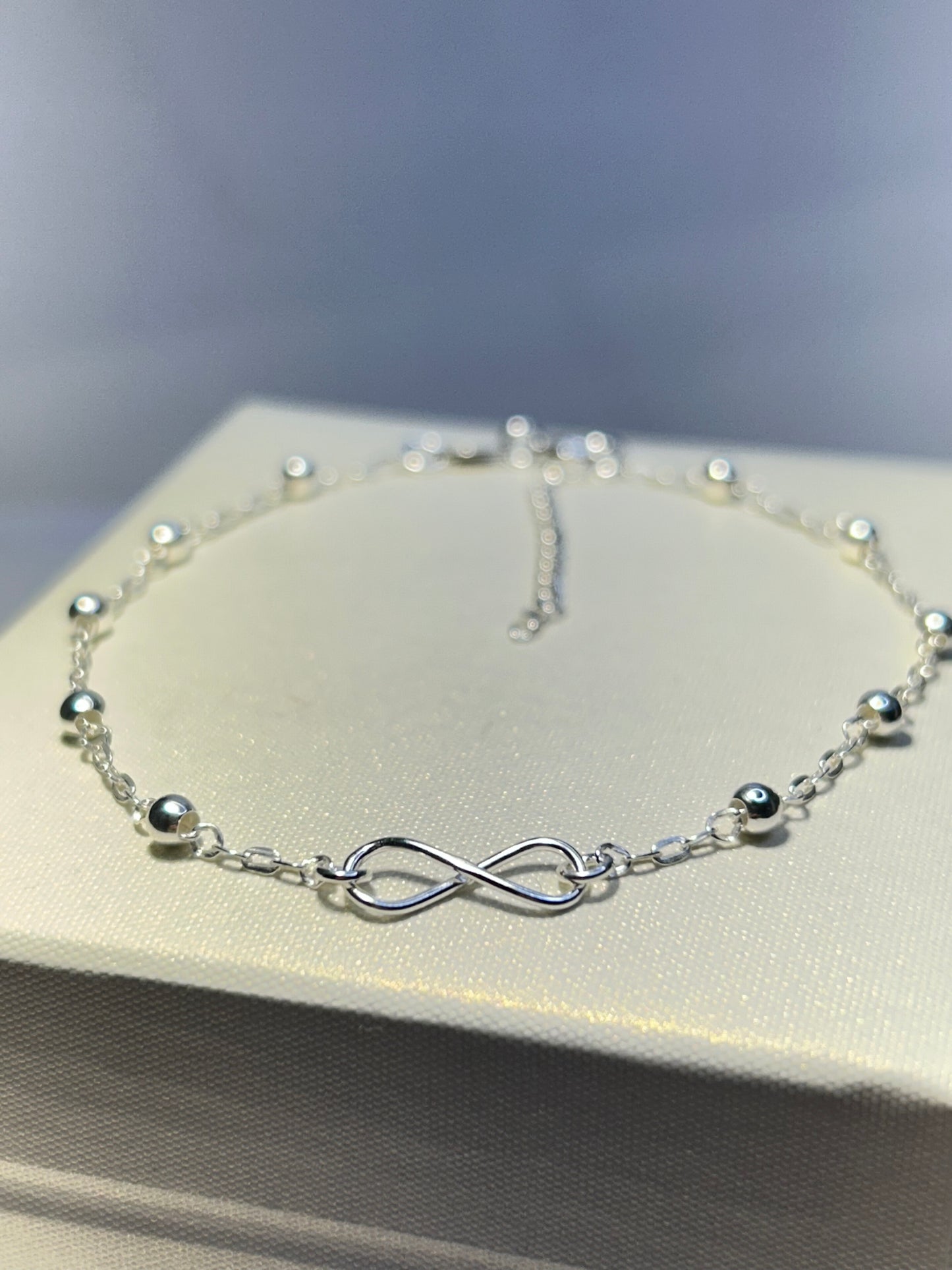Pulsera infinito y esferas