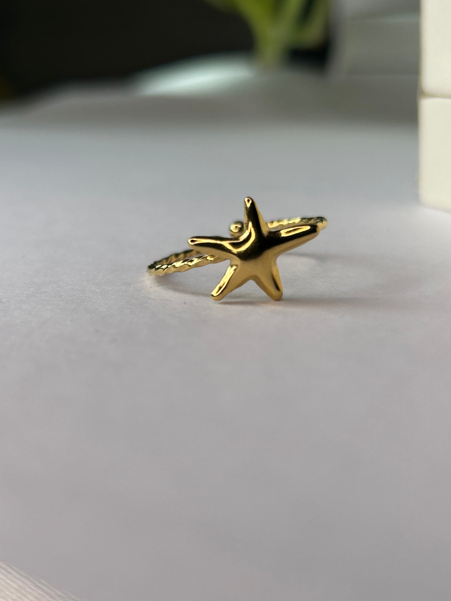 Anillo estrella dorada
