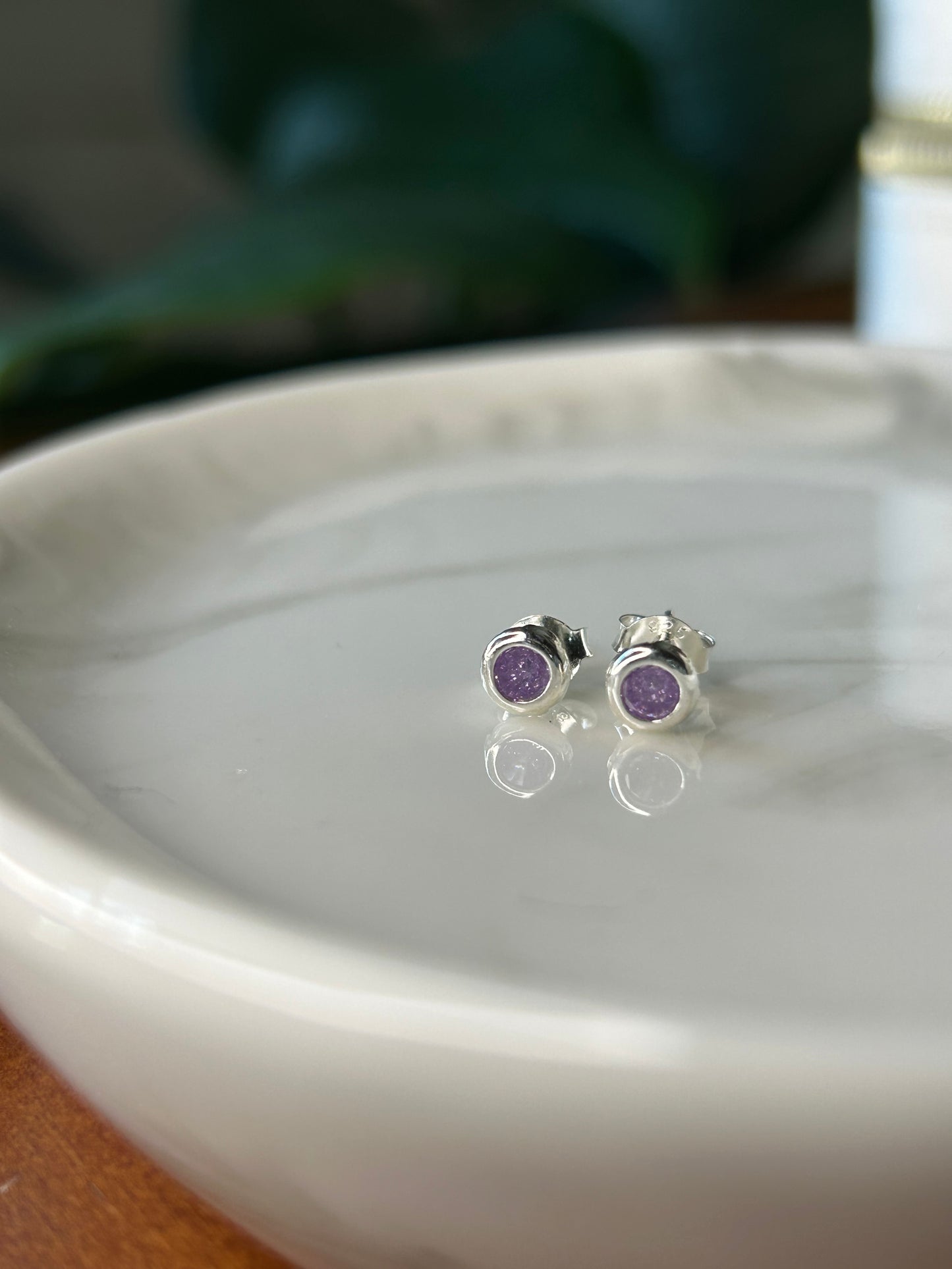 Caravanas punto de luz violeta