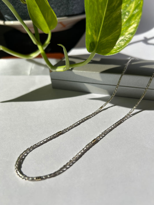 Cadena tourbillon plata y oro