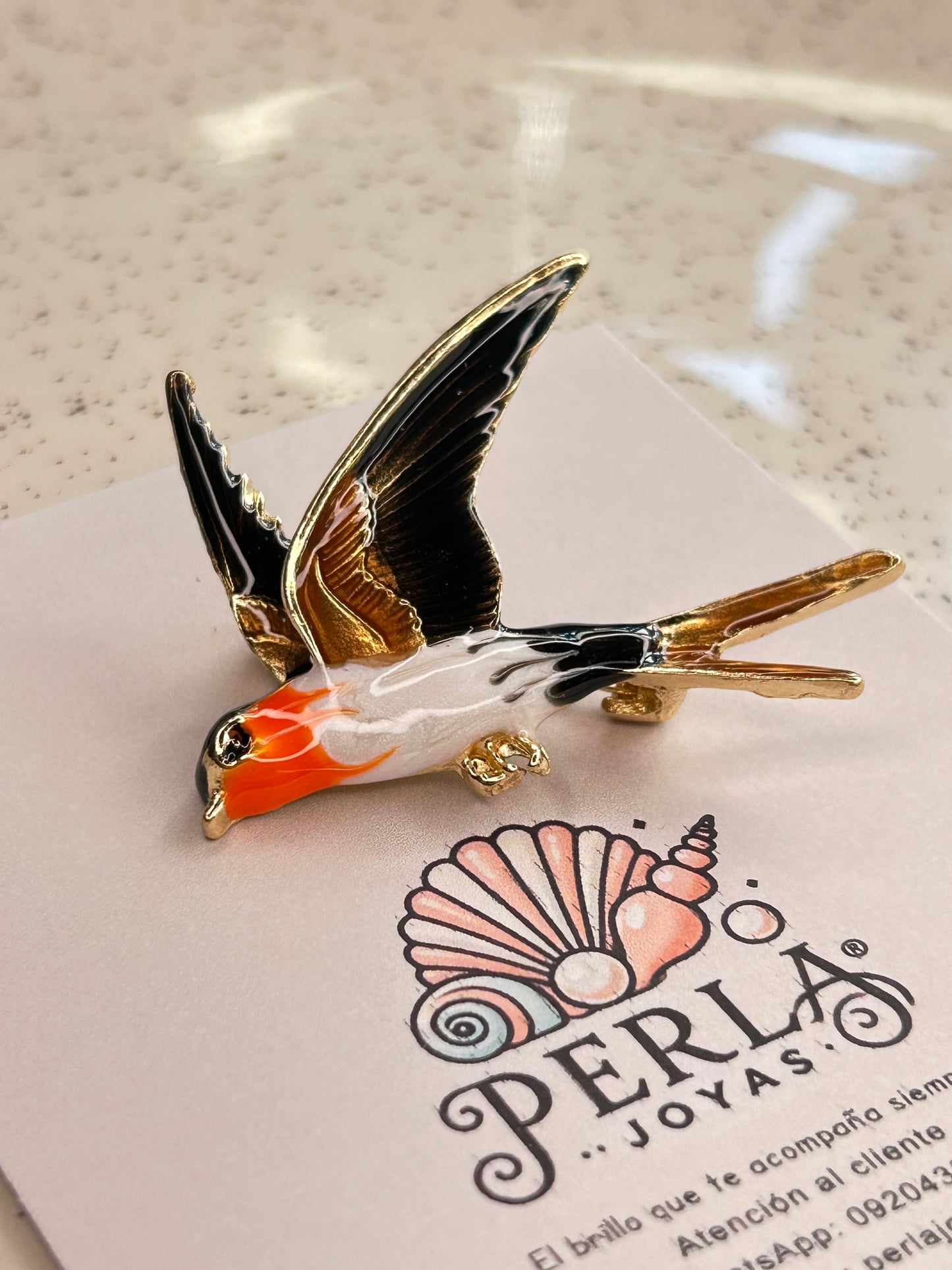 Prendedor golondrina blanco