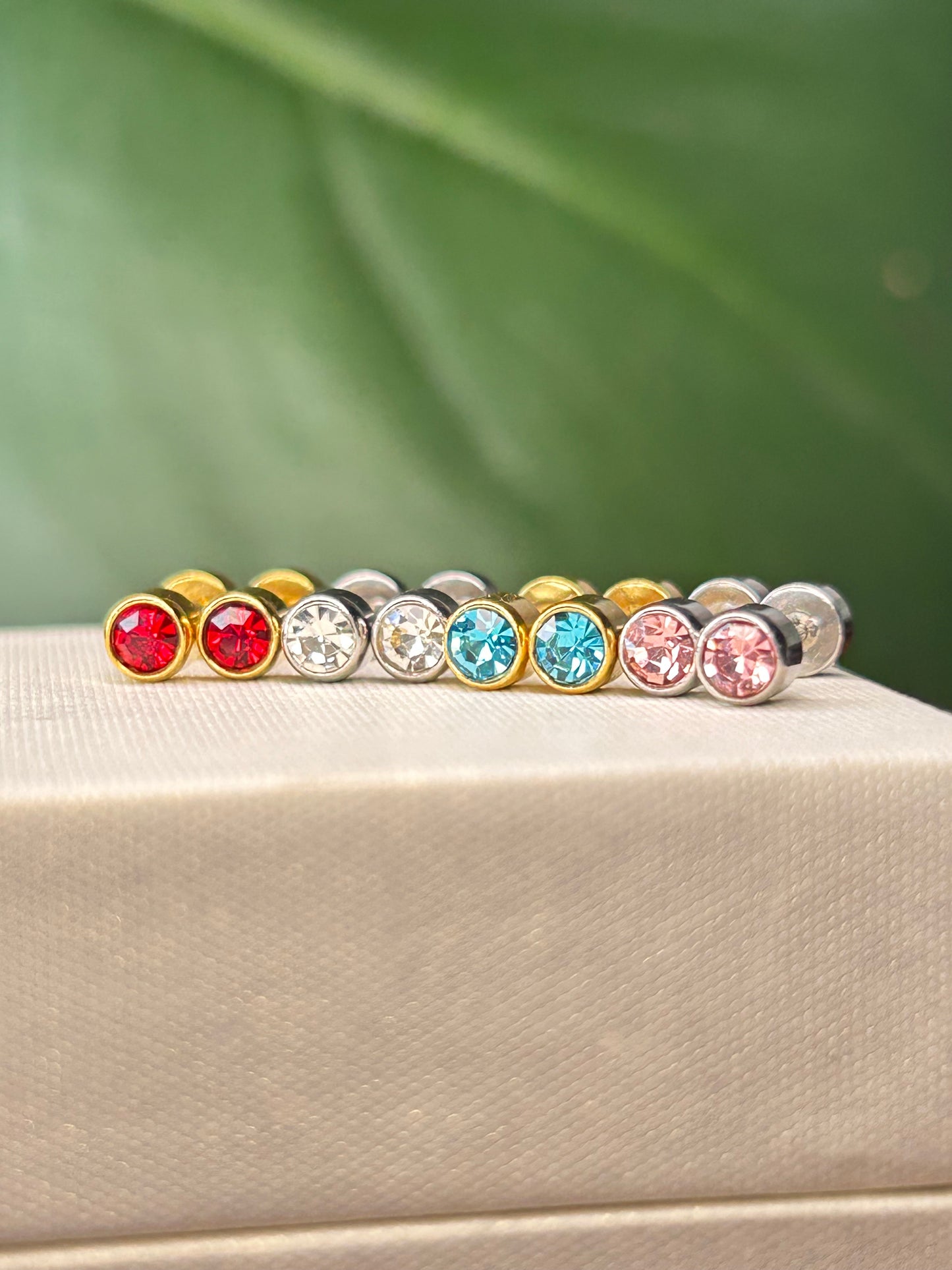 Caravanas punto de luz plateada