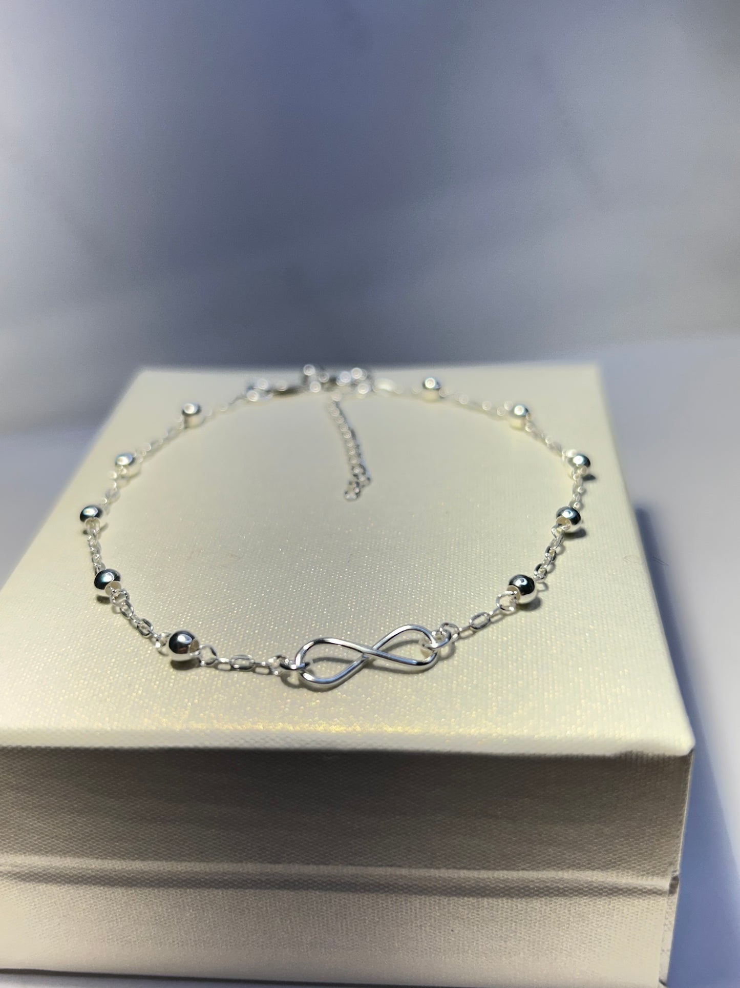 Pulsera infinito y esferas