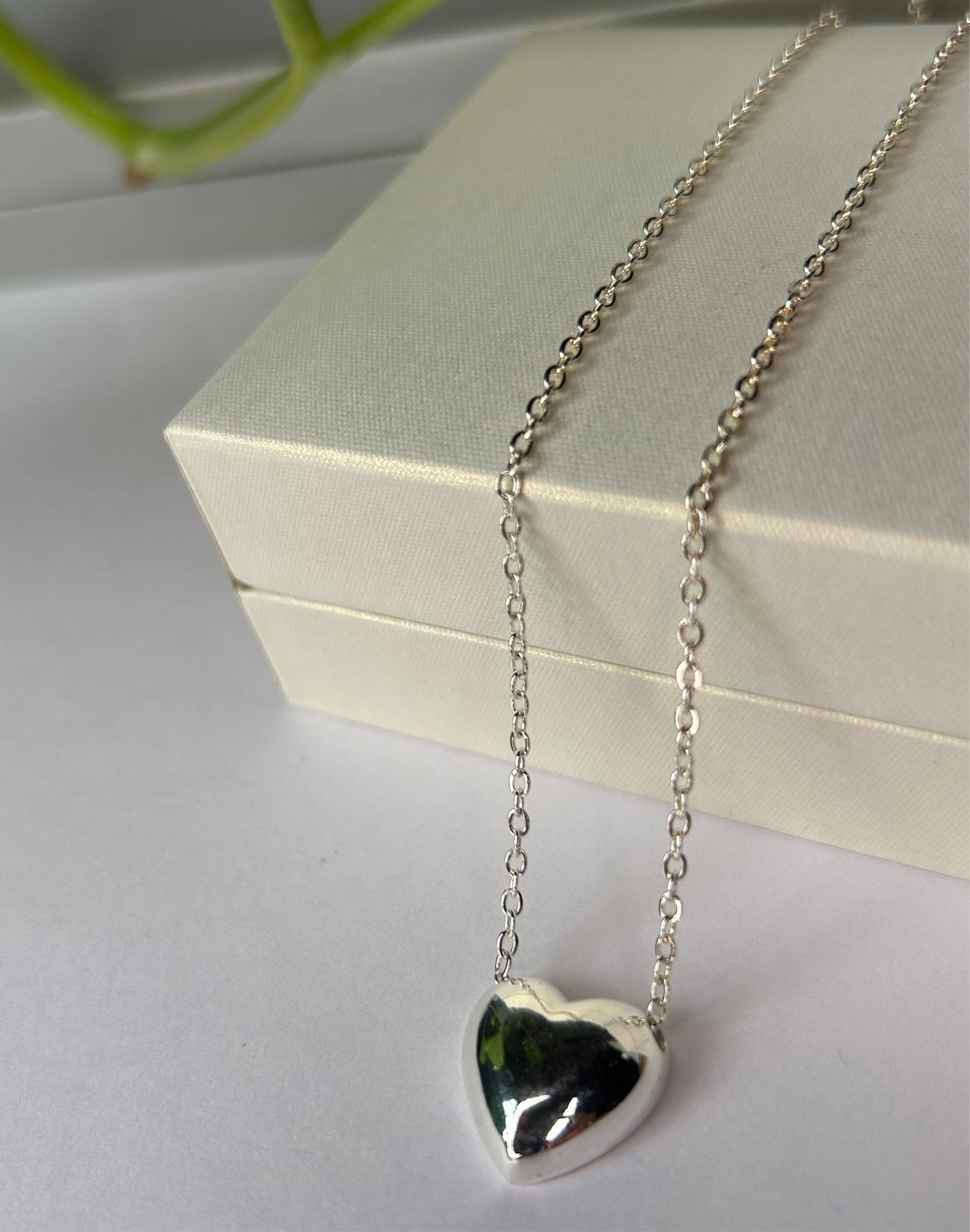 Conjunto corazón plateado