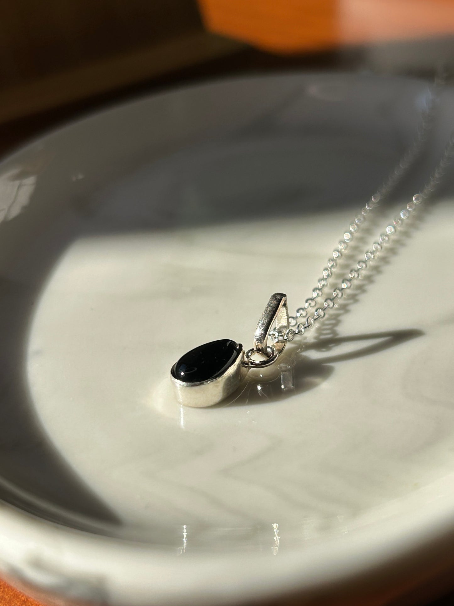 Dije ónix gota