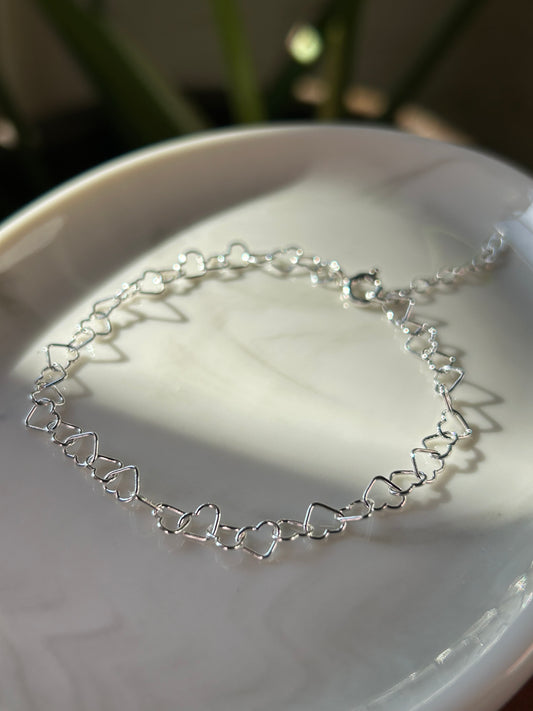 Pulsera corazones calados