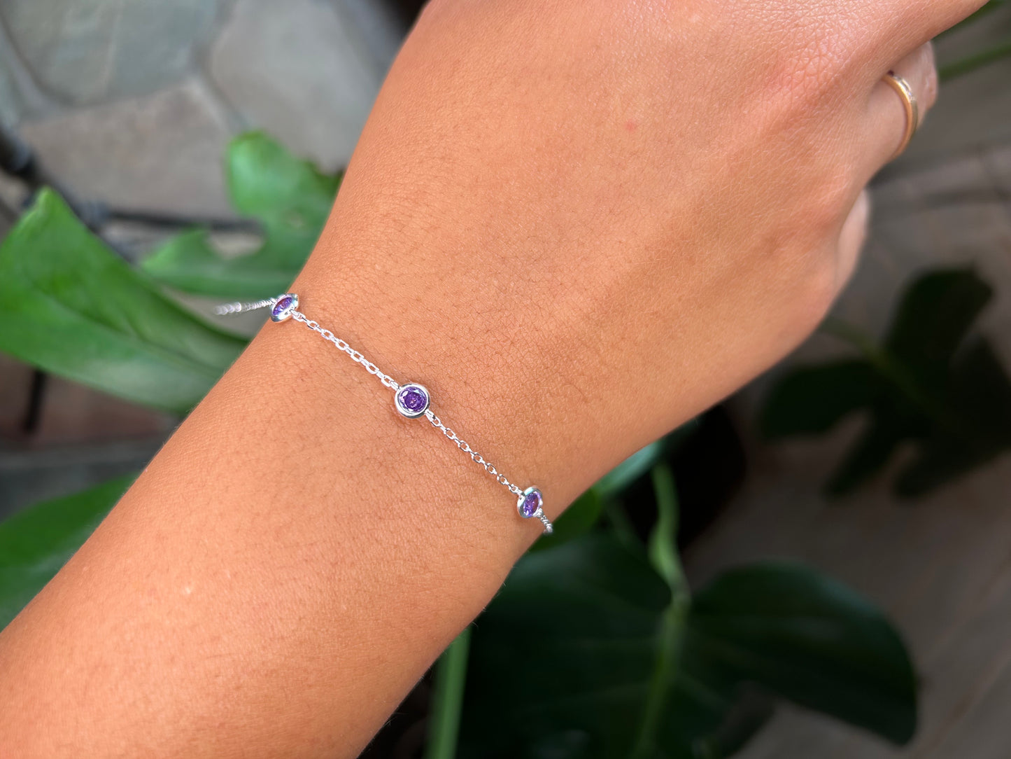 Pulsera punto de luz lila