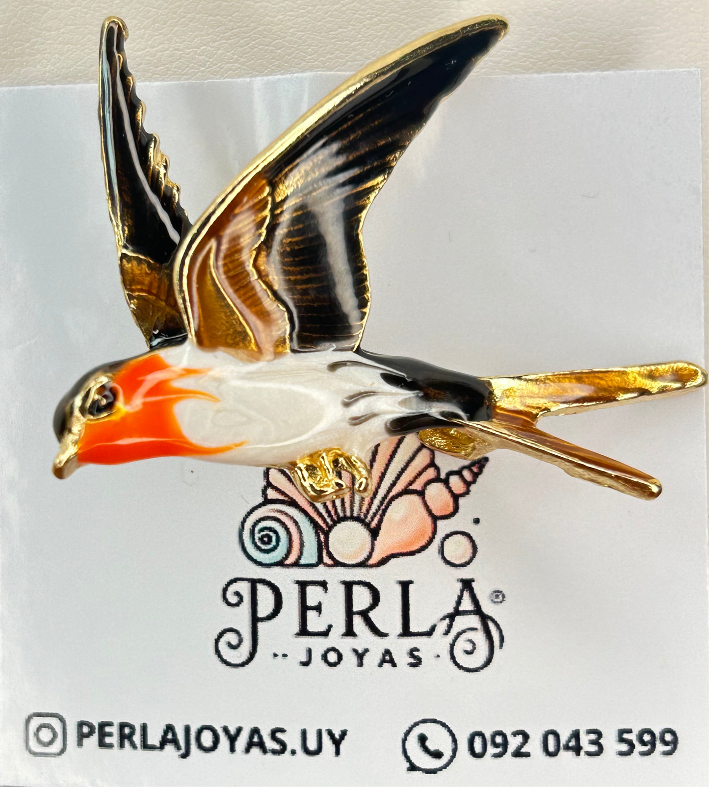 Prendedor golondrina blanco