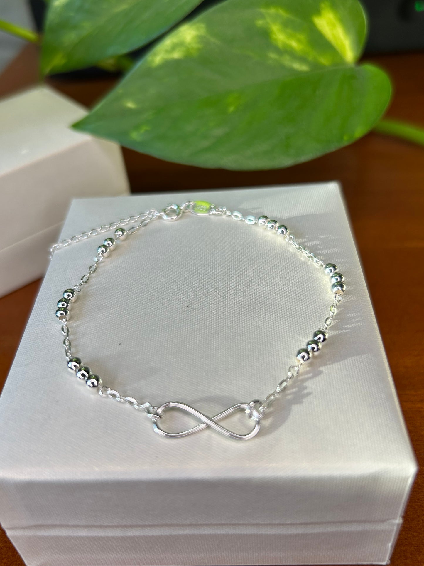 Pulsera infinito con mini esferas