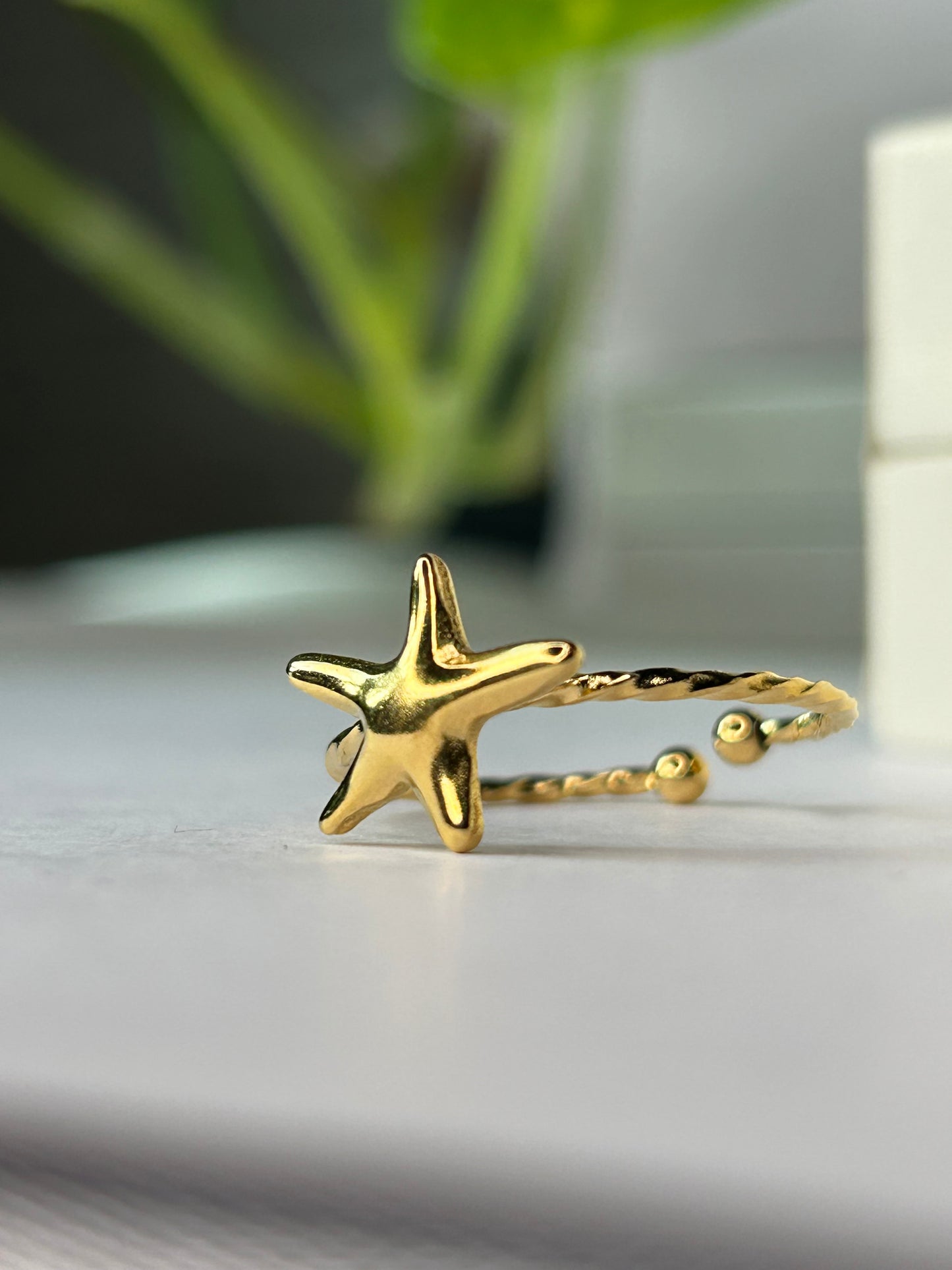 Anillo estrella dorada