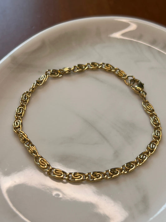 Pulsera caracol dorada