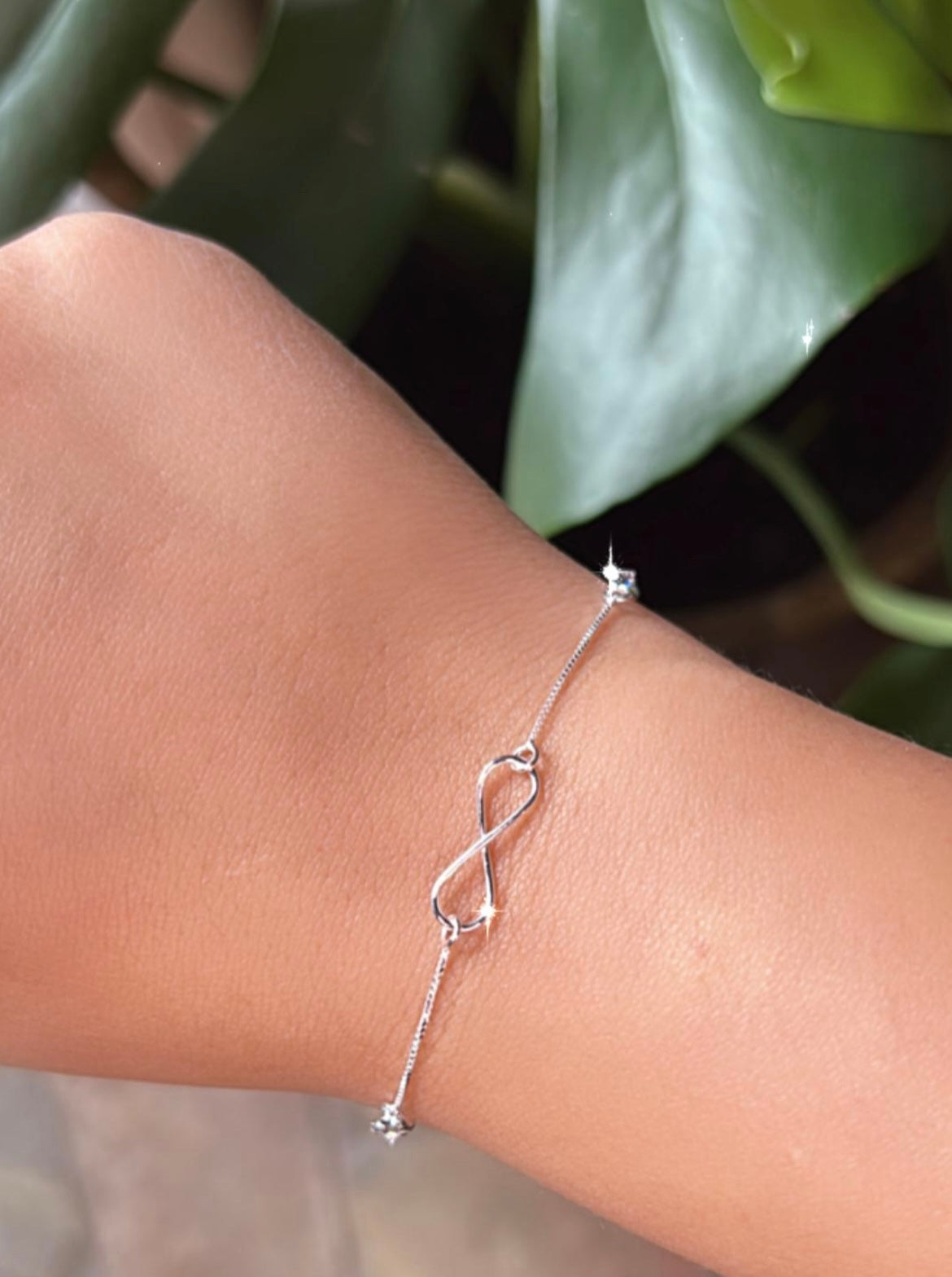 Pulsera infinito y puntos de luz