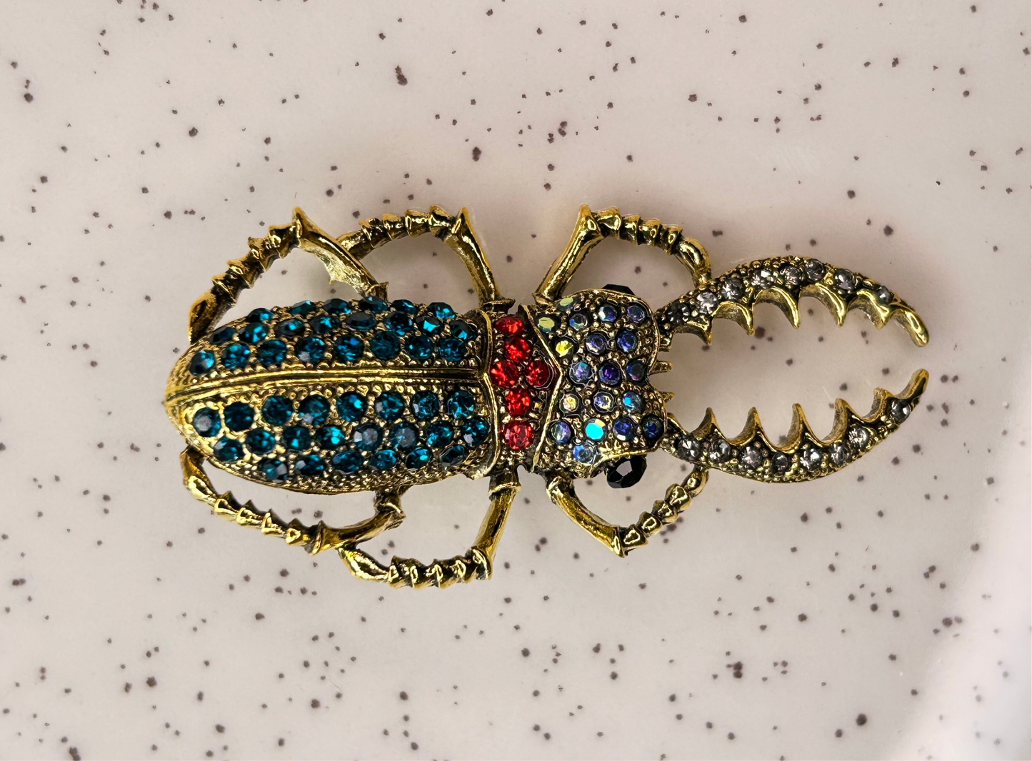 Prendedor escarabajo pinzas