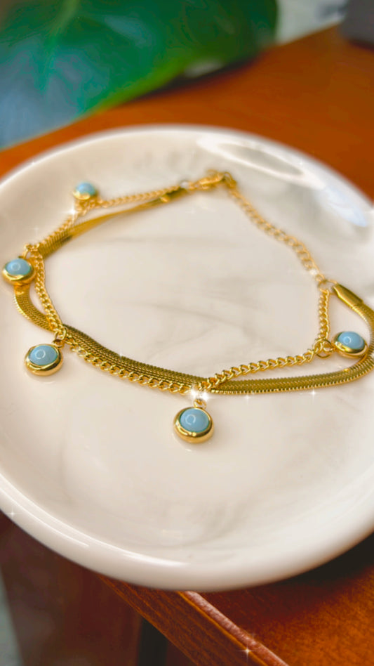 Pulsera serpentina y dijes