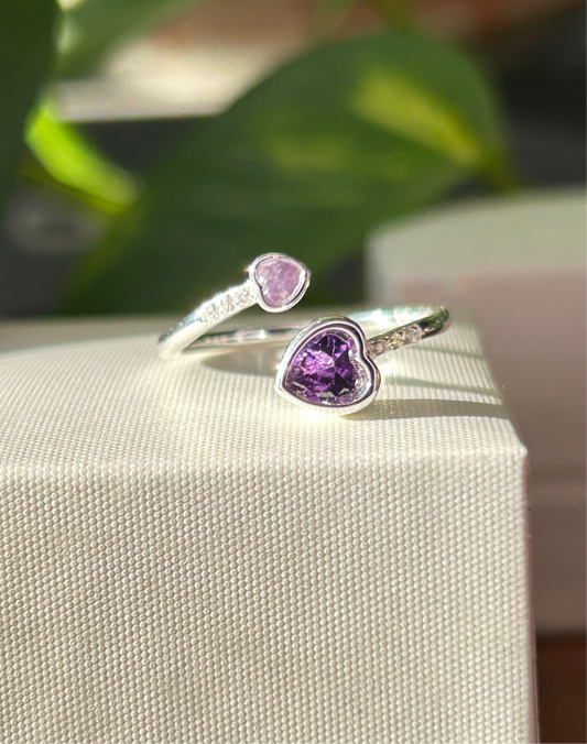 Anillo dos corazones lila