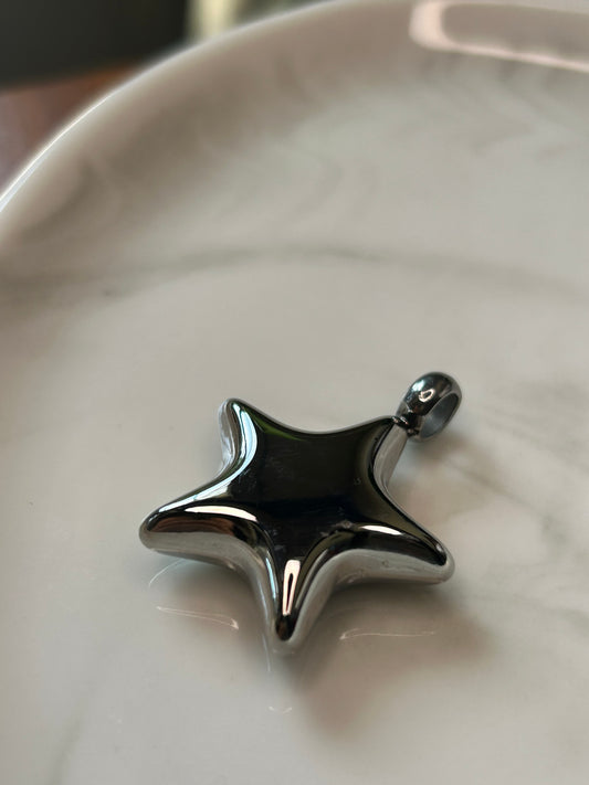 Dije estrella inflada