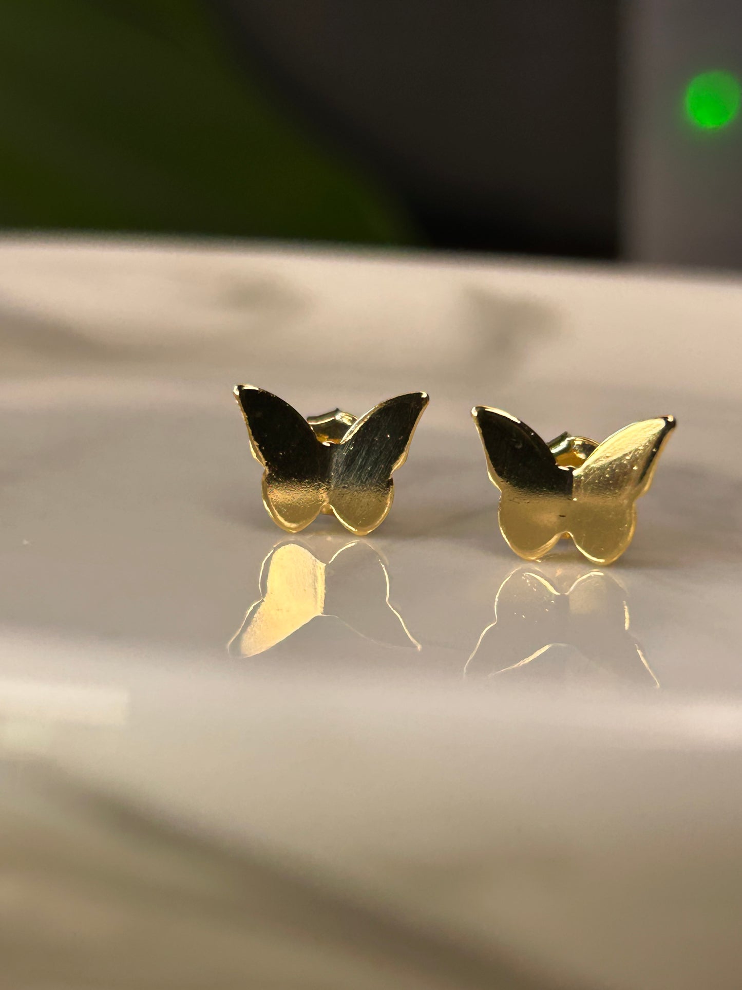 Caravanas mariposas doradas