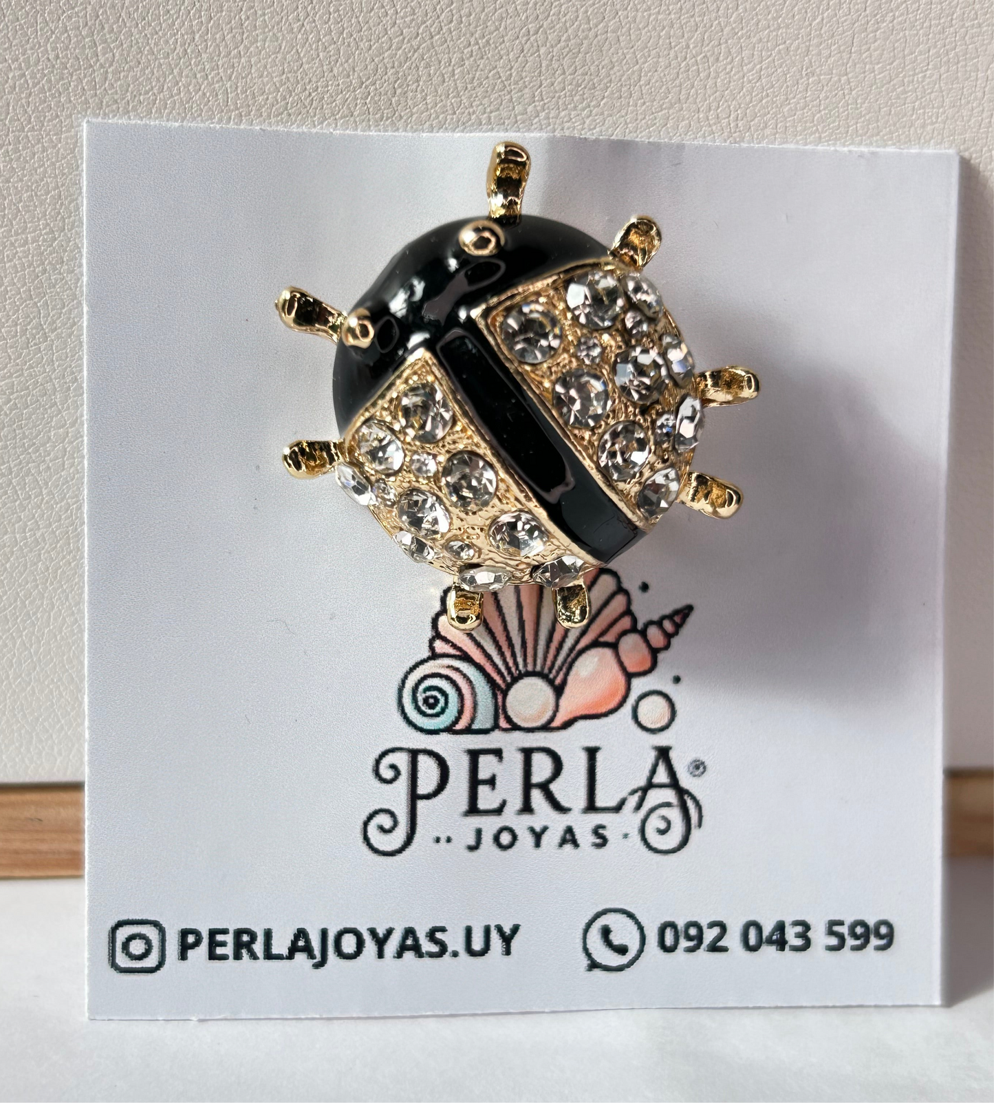 Prendedor mariquita cristales