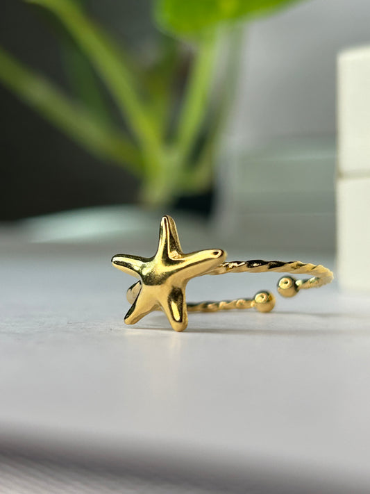 Anillo estrella dorada