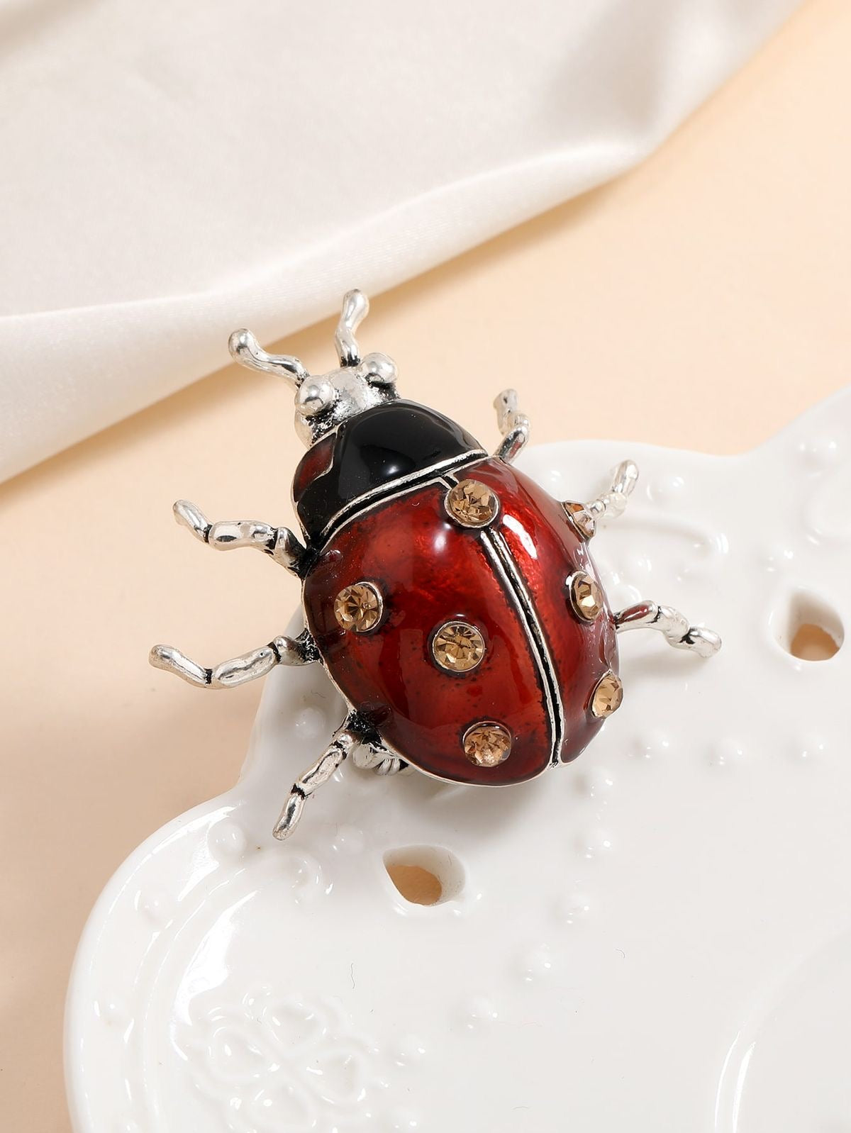 Prendedor mariquita blend