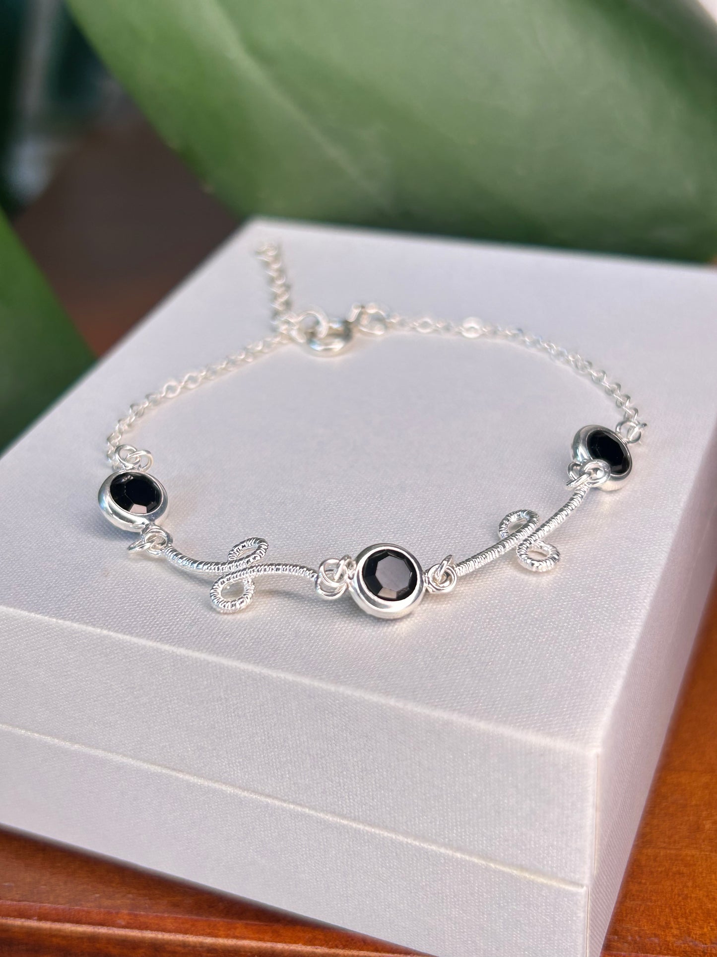 Pulsera infinito y cristales